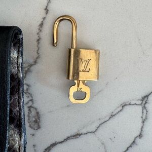 Louis Vuitton Gold Lock with Key